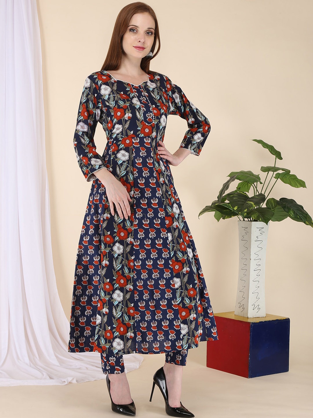 ERISHA Women Navy Blue Floral Printed Panelled Gotta Patti Pure Cotton Kurta with Trousers
ERISHA Women Navy Blue Floral Printed Panelled Gotta Patti Pure Cotton Kurta with Trousers