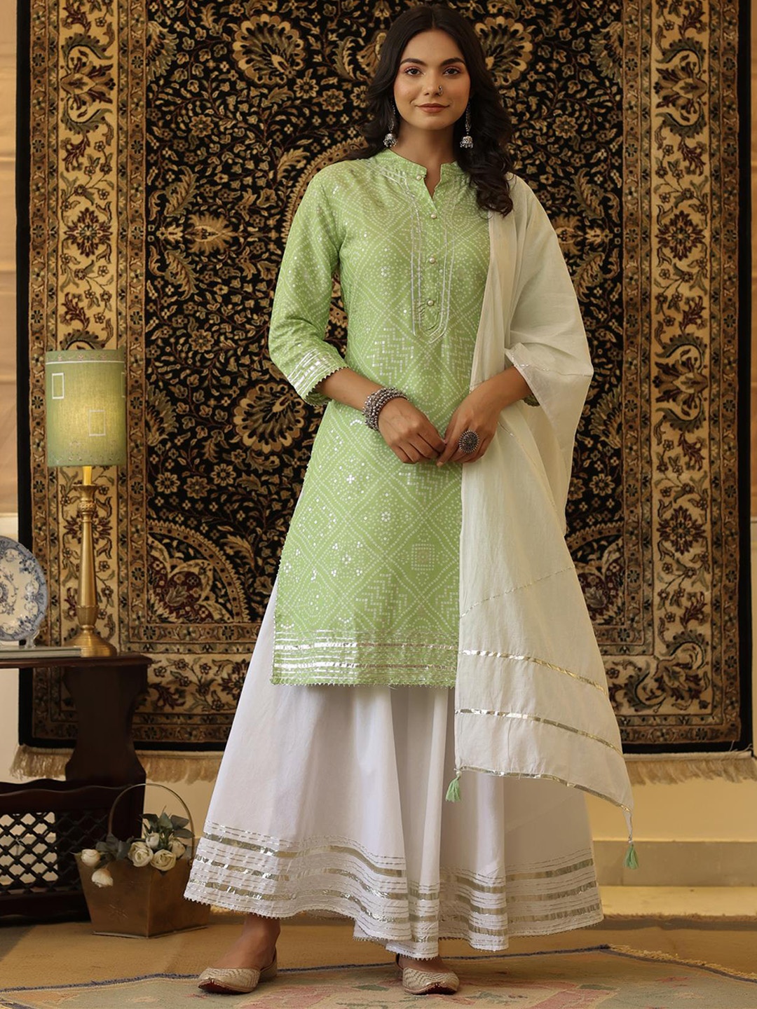 SCAKHI Women Sea Green Bandhani Printed Gotta Patti Pure Cotton Kurta with Skirt & With Dupatta
SCAKHI Women Sea Green Bandhani Printed Gotta Patti Pure Cotton Kurta with Skirt & With Dupatta