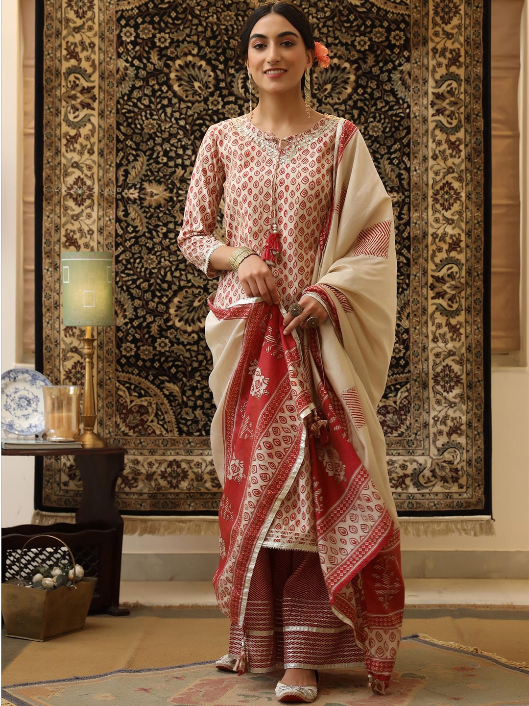 SCAKHI Women Coral Ethnic Motifs Printed Gotta Patti Kurta with Sharara & With Dupatta
SCAKHI Women Coral Ethnic Motifs Printed Gotta Patti Kurta with Sharara & With Dupatta