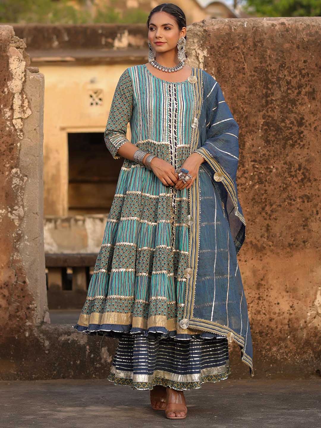 SCAKHI Women Blue Floral Printed Tiered Gotta Patti Pure Cotton Kurta with Skirt & With Dupatta
SCAKHI Women Blue Floral Printed Tiered Gotta Patti Pure Cotton Kurta with Skirt & With Dupatta