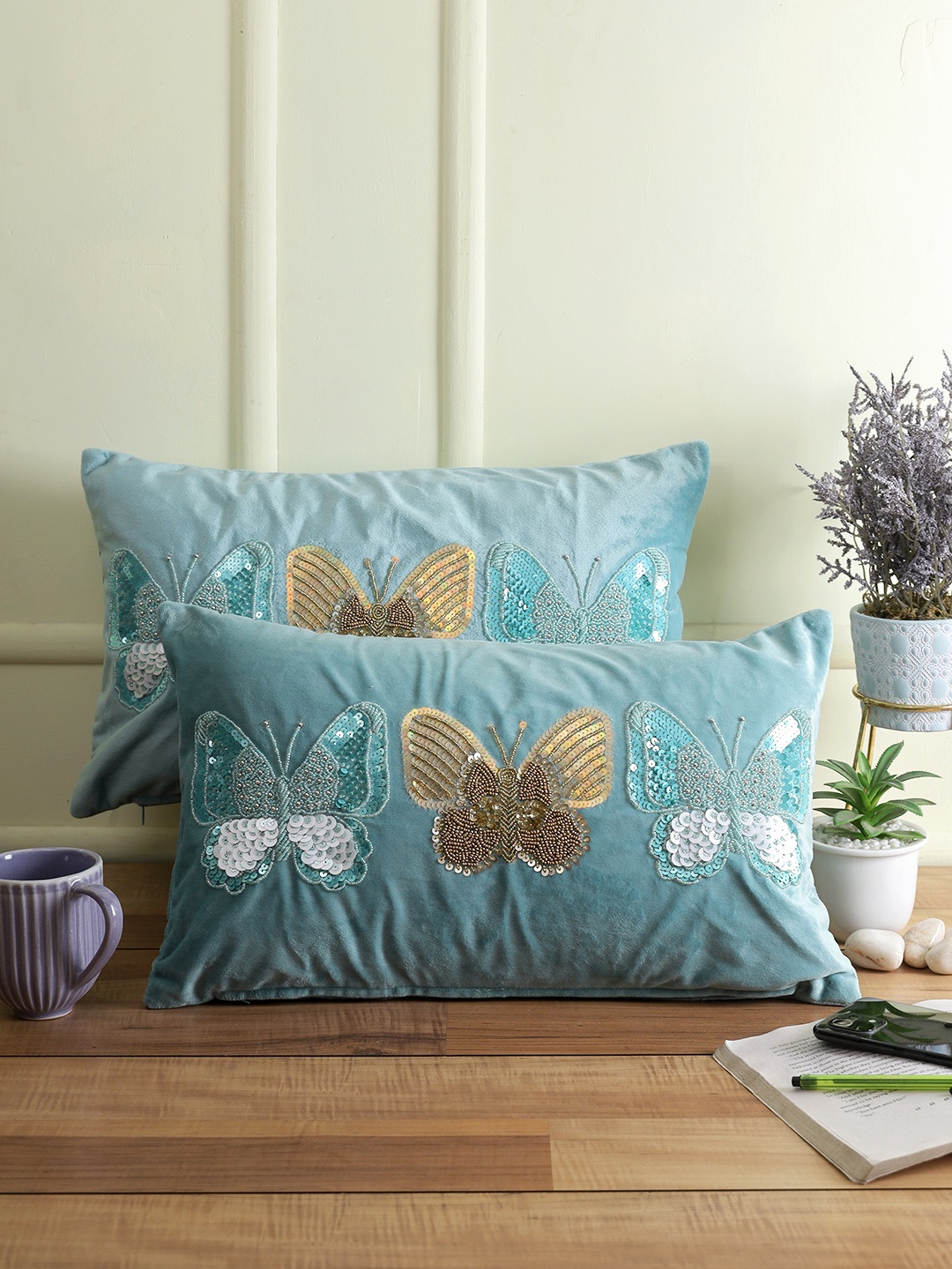 Sangria Turquoise Blue Set of 2 Blue Embroidered And Embellished Velvet Cushion Covers
Sangria Turquoise Blue Set of 2 Blue Embroidered And Embellished Velvet Cushion Covers
