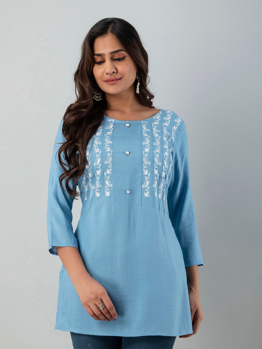 CKM Women Sky Blue And White Floral Embroidered Pleated Long Line Top, Turquoise blue
CKM Women Sky Blue And White Floral Embroidered Pleated Long Line Top, Turquoise blue