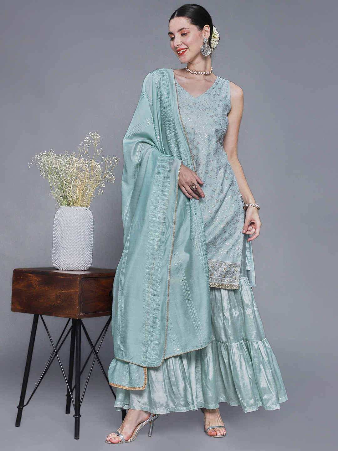 Sunehri Women Blue Floral Embroidered Sequinned Chanderi Silk Kurta with Sharara & Dupatta
Sunehri Women Blue Floral Embroidered Sequinned Chanderi Silk Kurta with Sharara & Dupatta