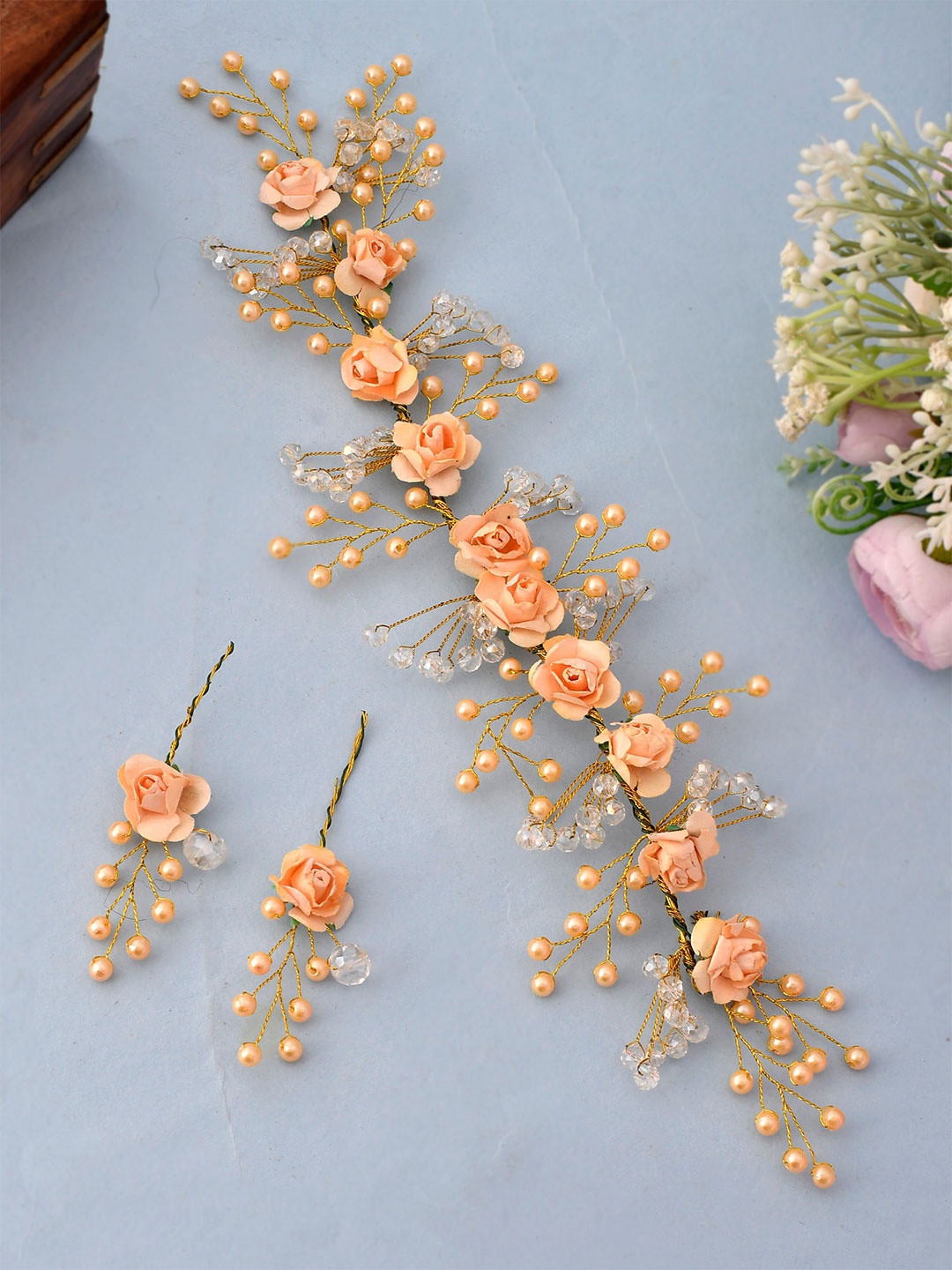 Silvermerc Designs Women Gold-Toned & Peach-Coloured Embellished Tiara Hair Ornament
Silvermerc Designs Women Gold-Toned & Peach-Coloured Embellished Tiara Hair Ornament