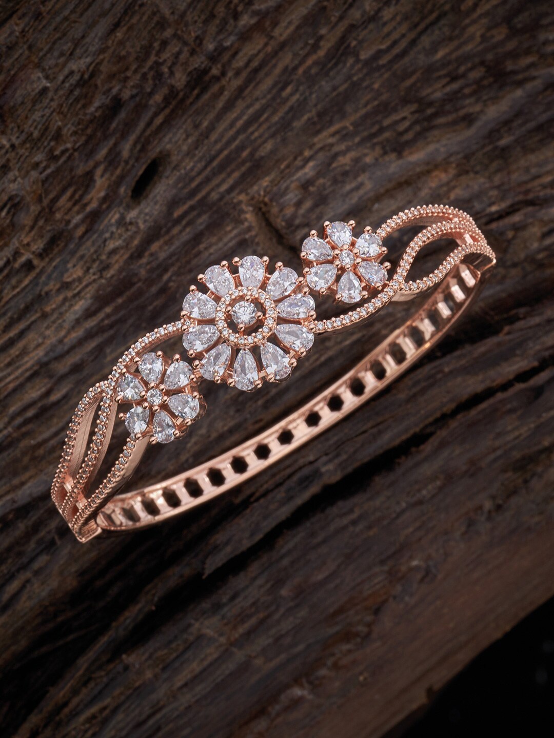 Kushal's Fashion Jewellery Women Gold-Toned & White Cubic Zirconia Rose Gold-Plated Kada Bracelet
Kushal's Fashion Jewellery Women Gold-Toned & White Cubic Zirconia Rose Gold-Plated Kada Bracelet