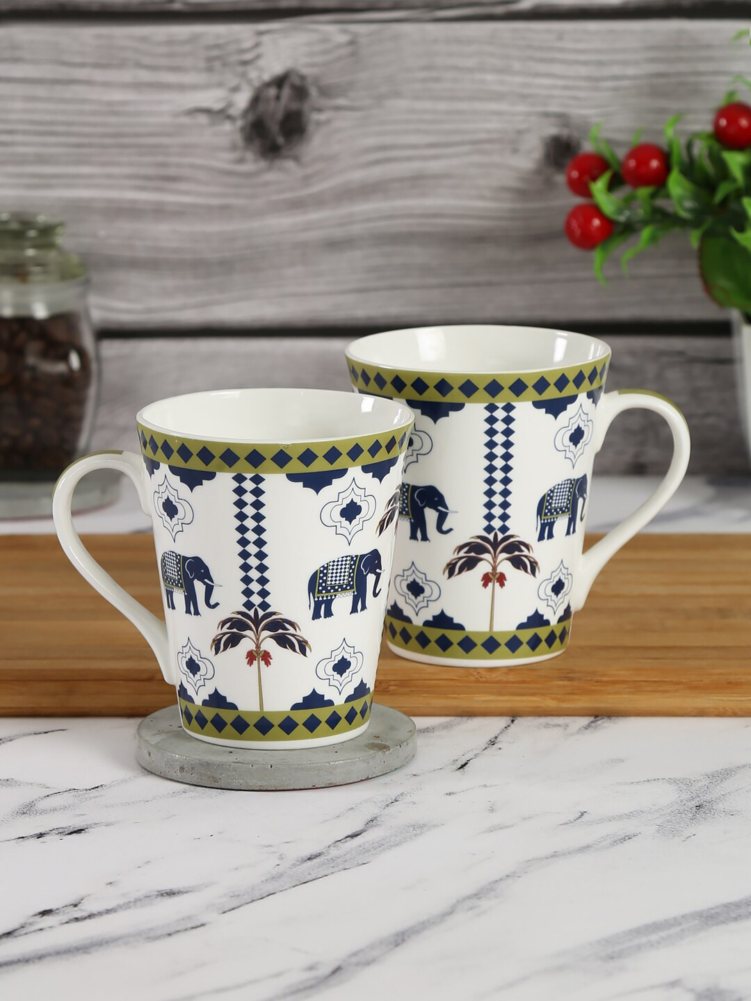 India Circus by Krsnaa Mehta Set of 2 White Microwave safe Bone China Mugs 300ml each
India Circus by Krsnaa Mehta Set of 2 White Microwave safe Bone China Mugs 300ml each