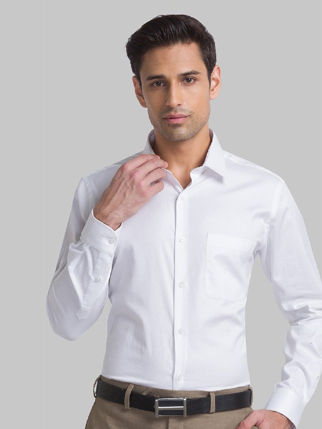 

Raymond Men White Solid Pure Cotton Casual Shirt