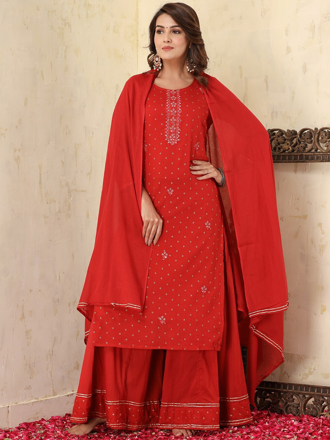 KAAJH Women Red Floral Printed Mirror Work Pure Cotton Kurta with Sharara & With Dupatta
KAAJH Women Red Floral Printed Mirror Work Pure Cotton Kurta with Sharara & With Dupatta