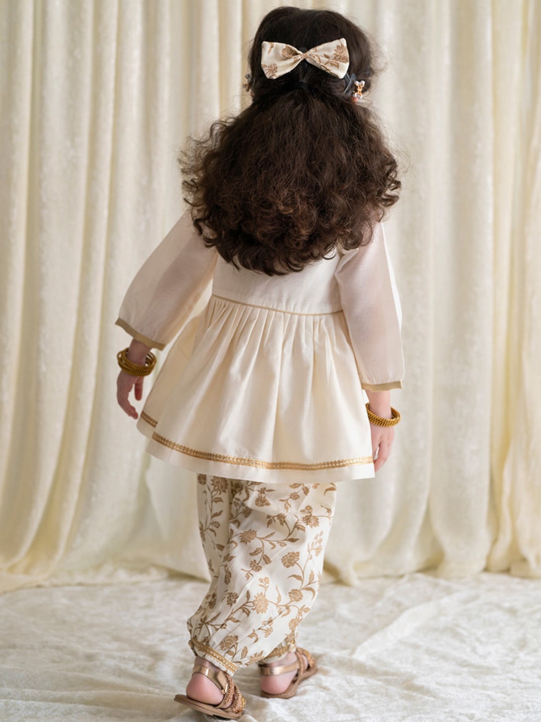 Tiber Taber Girls Floral Embroidered Chanderi Silk Kurta with Salwar & Bow, Cream
Tiber Taber Girls Floral Embroidered Chanderi Silk Kurta with Salwar & Bow, Cream