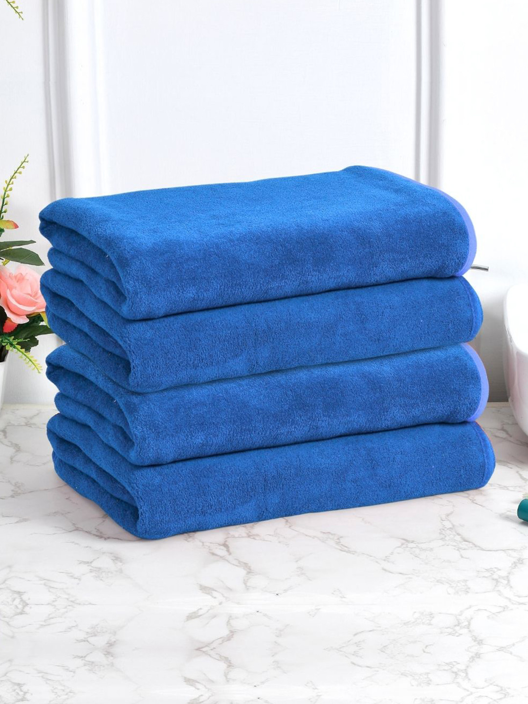 Black gold Set Of 4 Blue Solid 400 GSM Microfiber Bath Towels 
Black gold Set Of 4 Blue Solid 400 GSM Microfiber Bath Towels