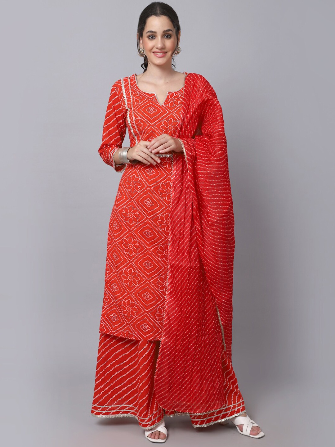 anokherang Women Red Bandhani Printed Pure Cotton Kurta with Palazzos & With Dupatta
anokherang Women Red Bandhani Printed Pure Cotton Kurta with Palazzos & With Dupatta