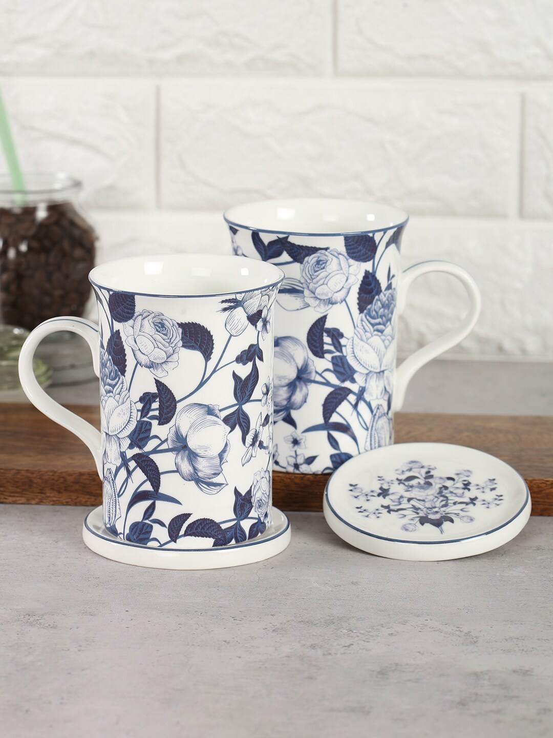 India Circus by Krsnaa Mehta Set of 2 Bone China Mugs and Coasters 380ml each, White
India Circus by Krsnaa Mehta Set of 2 Bone China Mugs and Coasters 380ml each, White