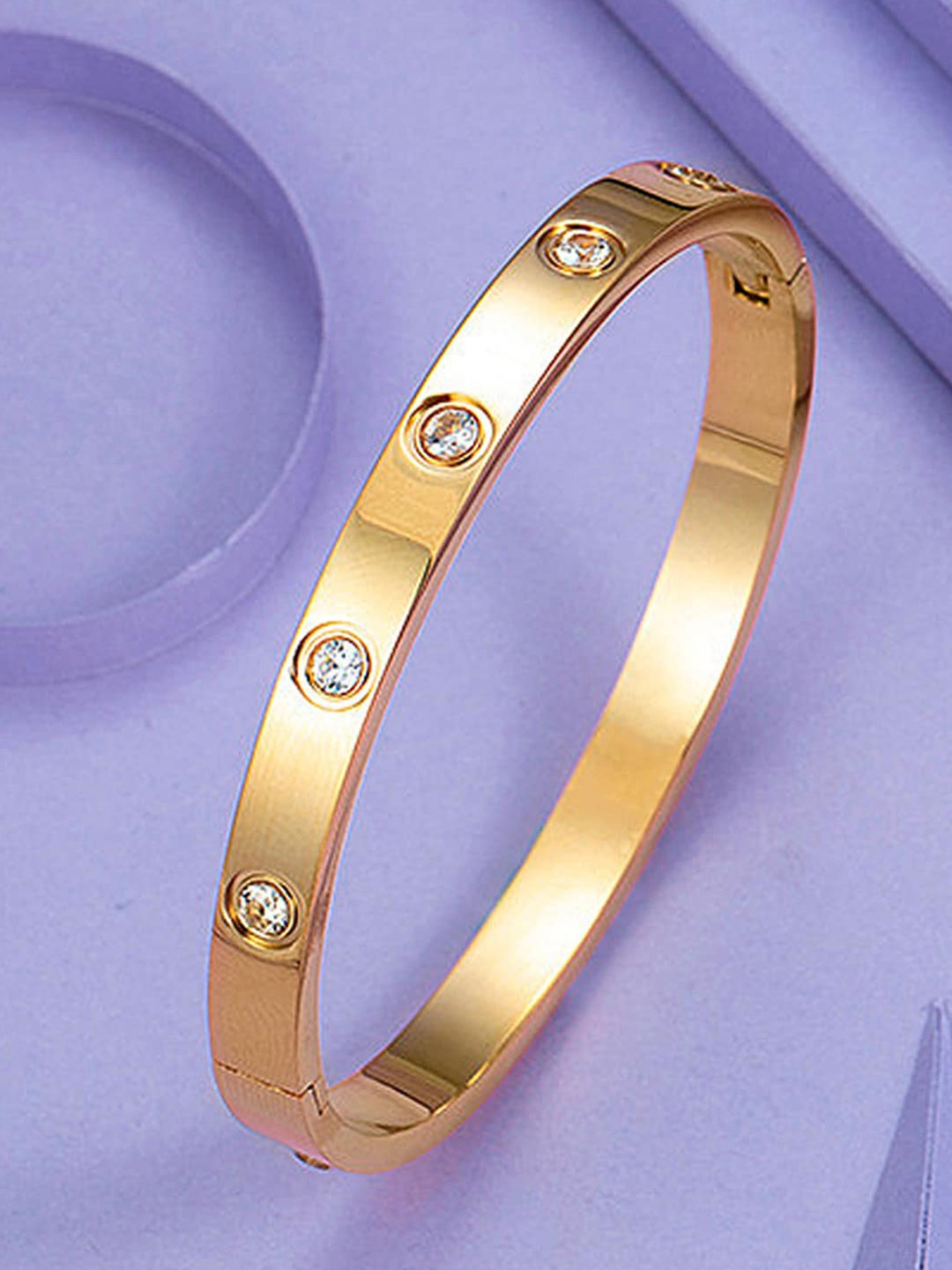Designs By Jewels Galaxy Women Gold-Toned American Diamond Gold-Plated Bangle-Style Bracelet
Designs By Jewels Galaxy Women Gold-Toned American Diamond Gold-Plated Bangle-Style Bracelet