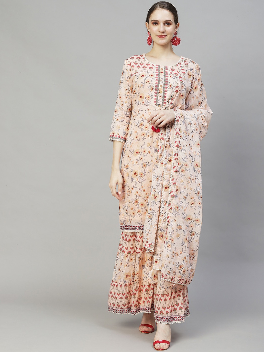 FASHOR Women Peach-Coloured Floral Printed Pure Cotton Kurta with Sharara & With Dupatta
FASHOR Women Peach-Coloured Floral Printed Pure Cotton Kurta with Sharara & With Dupatta