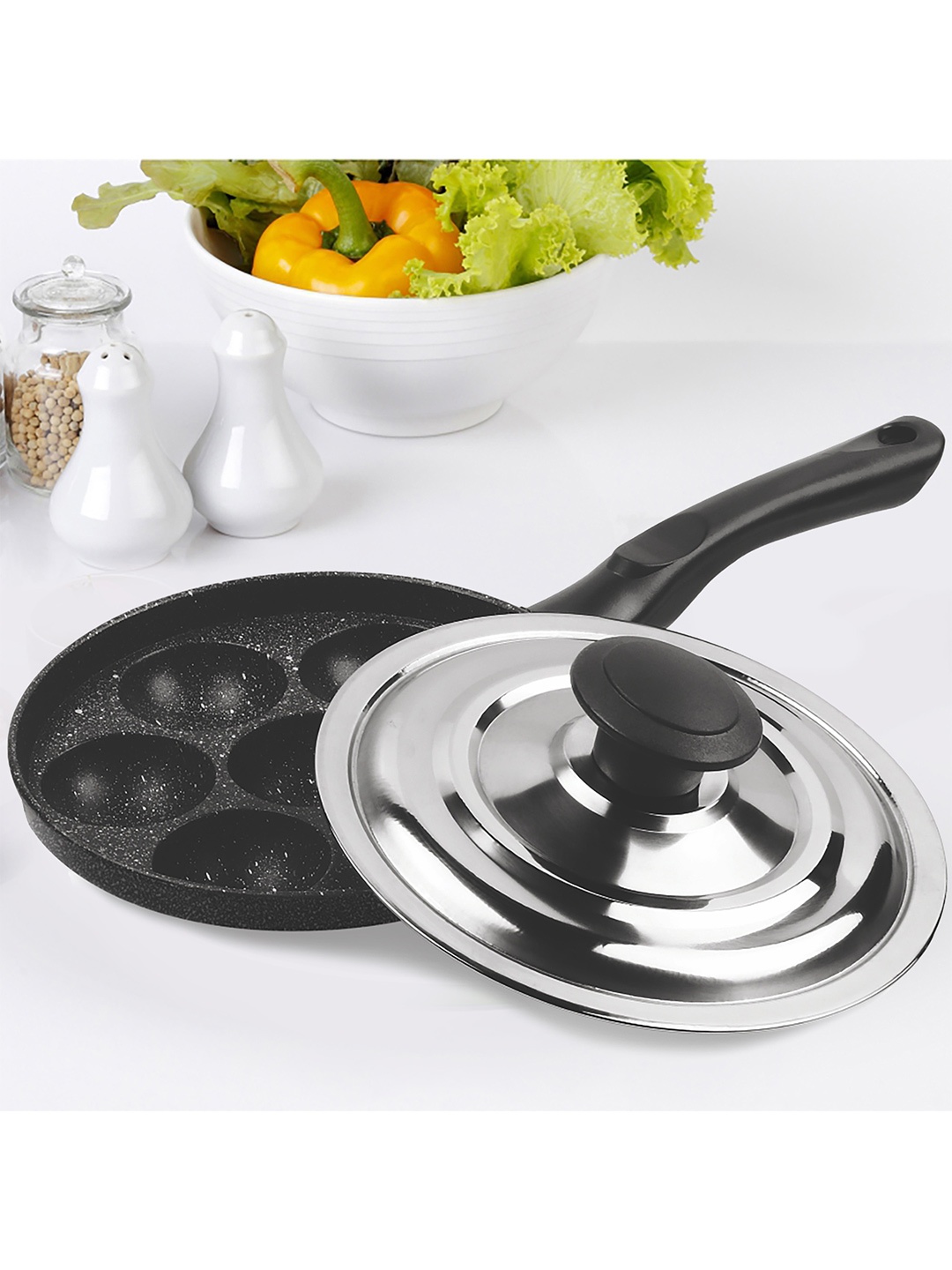 Milton Black Pro Cook Granito Non Induction Appam Patra 7 Pit With Stainless Steel Lid
Milton Black Pro Cook Granito Non Induction Appam Patra 7 Pit With Stainless Steel Lid