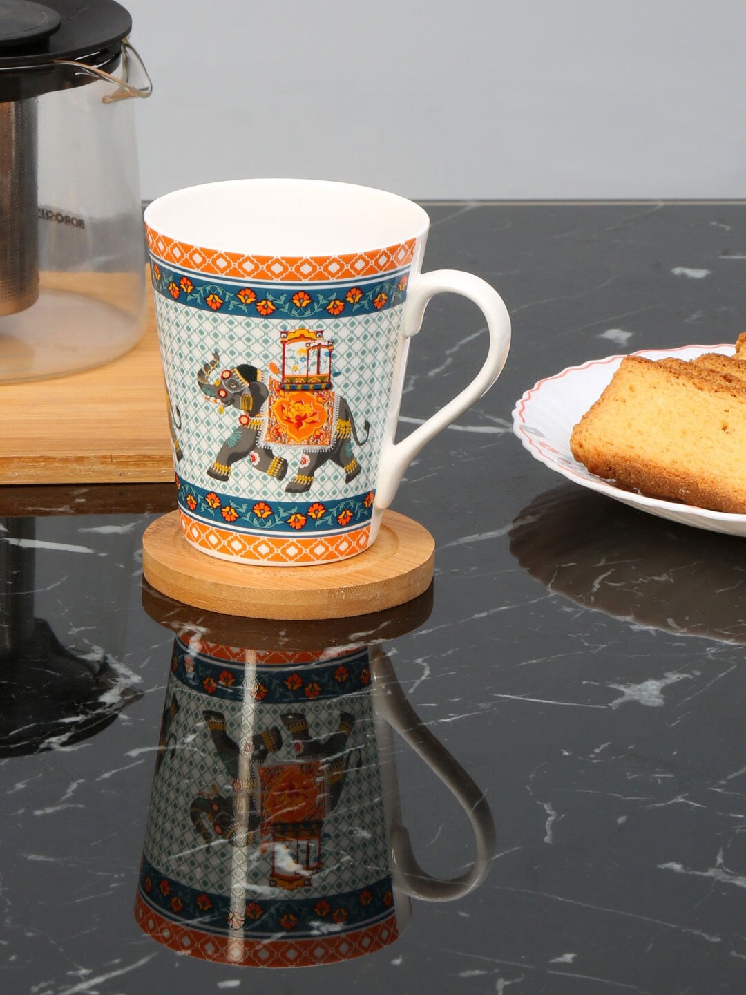 Athome by Nilkamal Green & Orange Set of 2 Printed Bone China Glossy Mugs 350 ml Each
Athome by Nilkamal Green & Orange Set of 2 Printed Bone China Glossy Mugs 350 ml Each