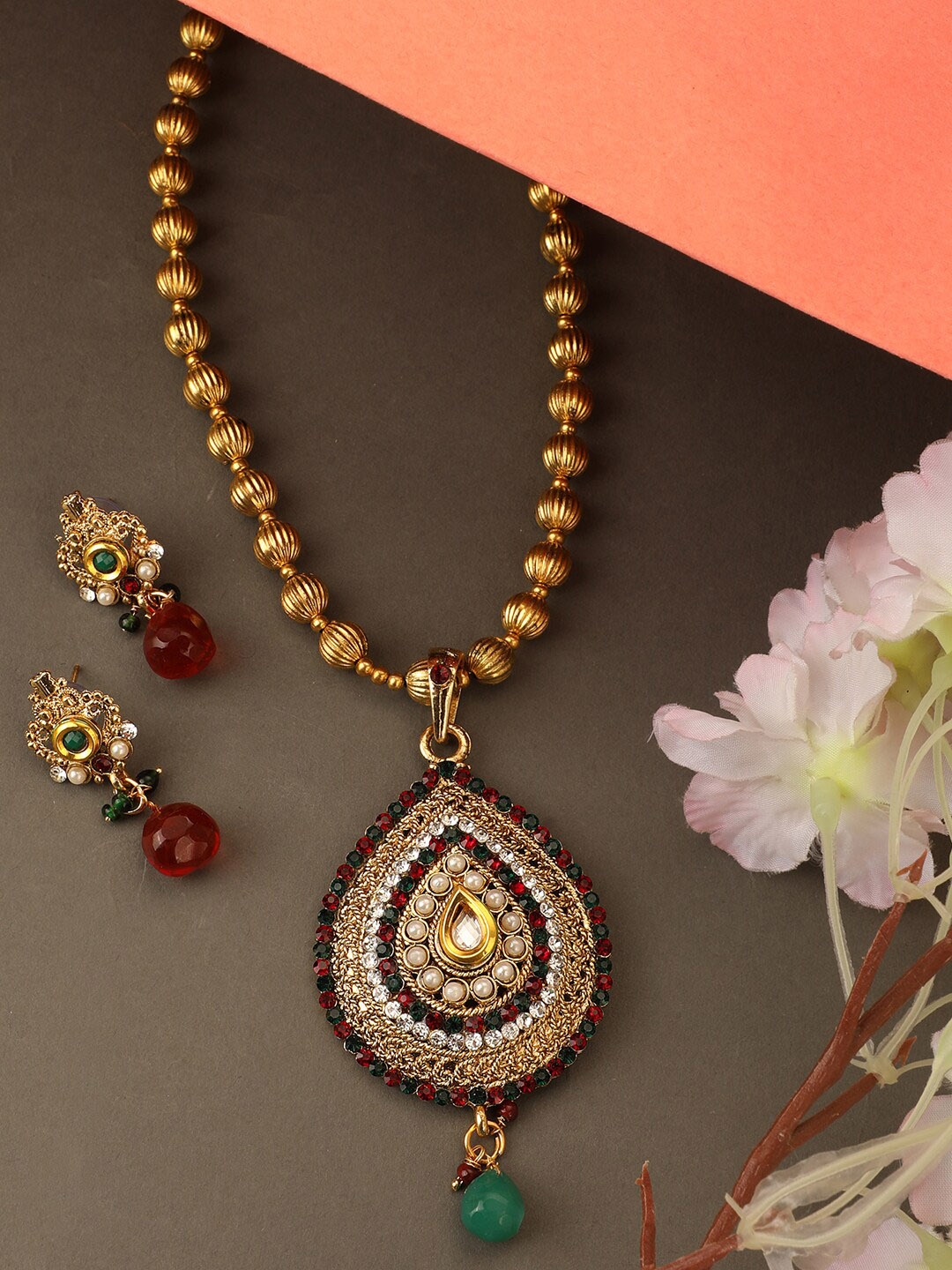 ANIKAS CREATION Gold-Plated Maroon & Green Stone Studded Beaded Traditional Pendant Set With Earrings, Multi
ANIKAS CREATION Gold-Plated Maroon & Green Stone Studded Beaded Traditional Pendant Set With Earrings, Multi