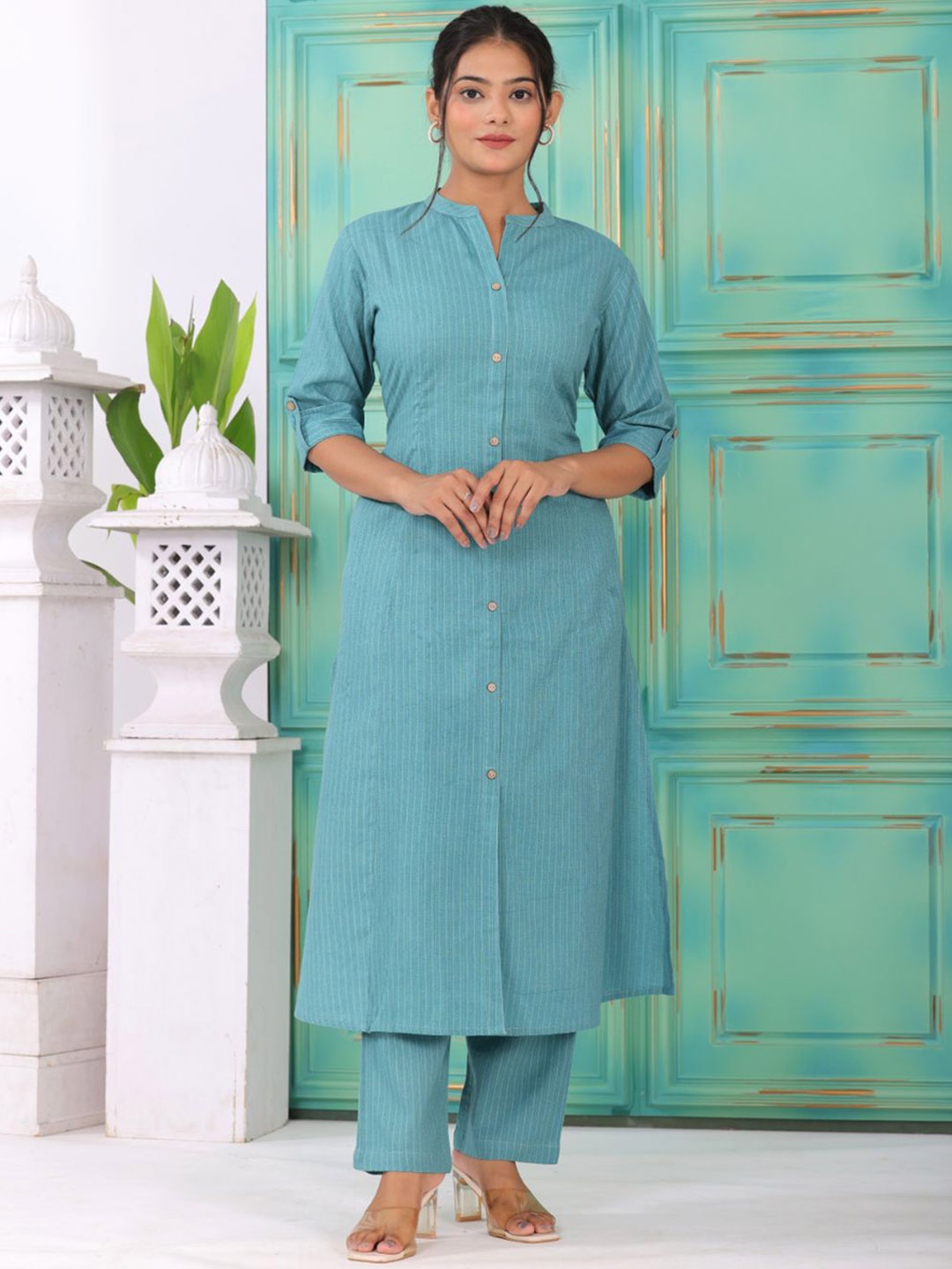 KALINI Striped Mandarin Collar Roll-Up Sleeves Pure Cotton A-Line Kurta with Trousers, Turquoise blue
KALINI Striped Mandarin Collar Roll-Up Sleeves Pure Cotton A-Line Kurta with Trousers, Turquoise blue