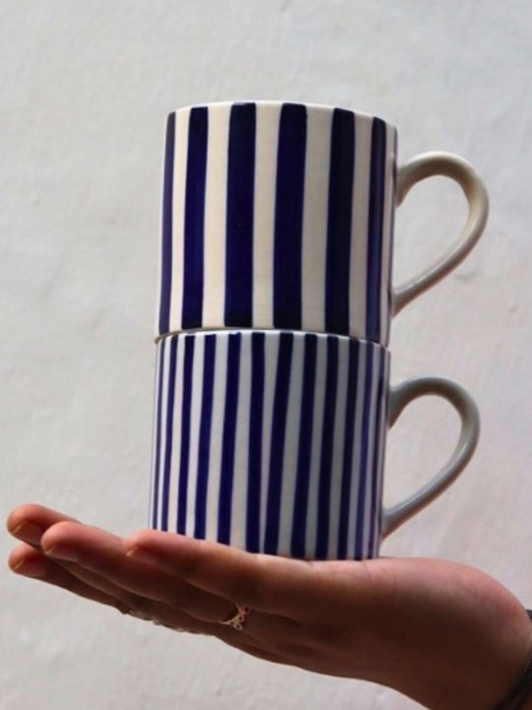 WEAVING HOMES White & Blue Striped 2 Pieces Ceramic Microwave Safe Glossy Cups 150 ml
WEAVING HOMES White & Blue Striped 2 Pieces Ceramic Microwave Safe Glossy Cups 150 ml