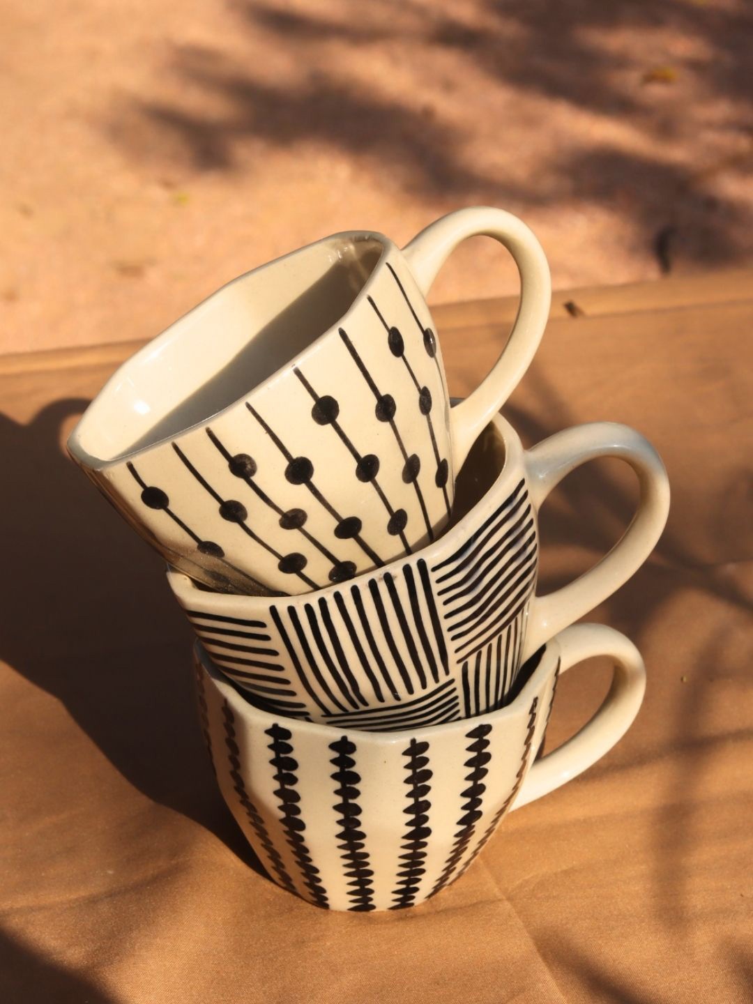 WEAVING HOMES Beige & Black 3 Pieces Printed Ceramic Glossy Finished Cups 220 ml Each
WEAVING HOMES Beige & Black 3 Pieces Printed Ceramic Glossy Finished Cups 220 ml Each