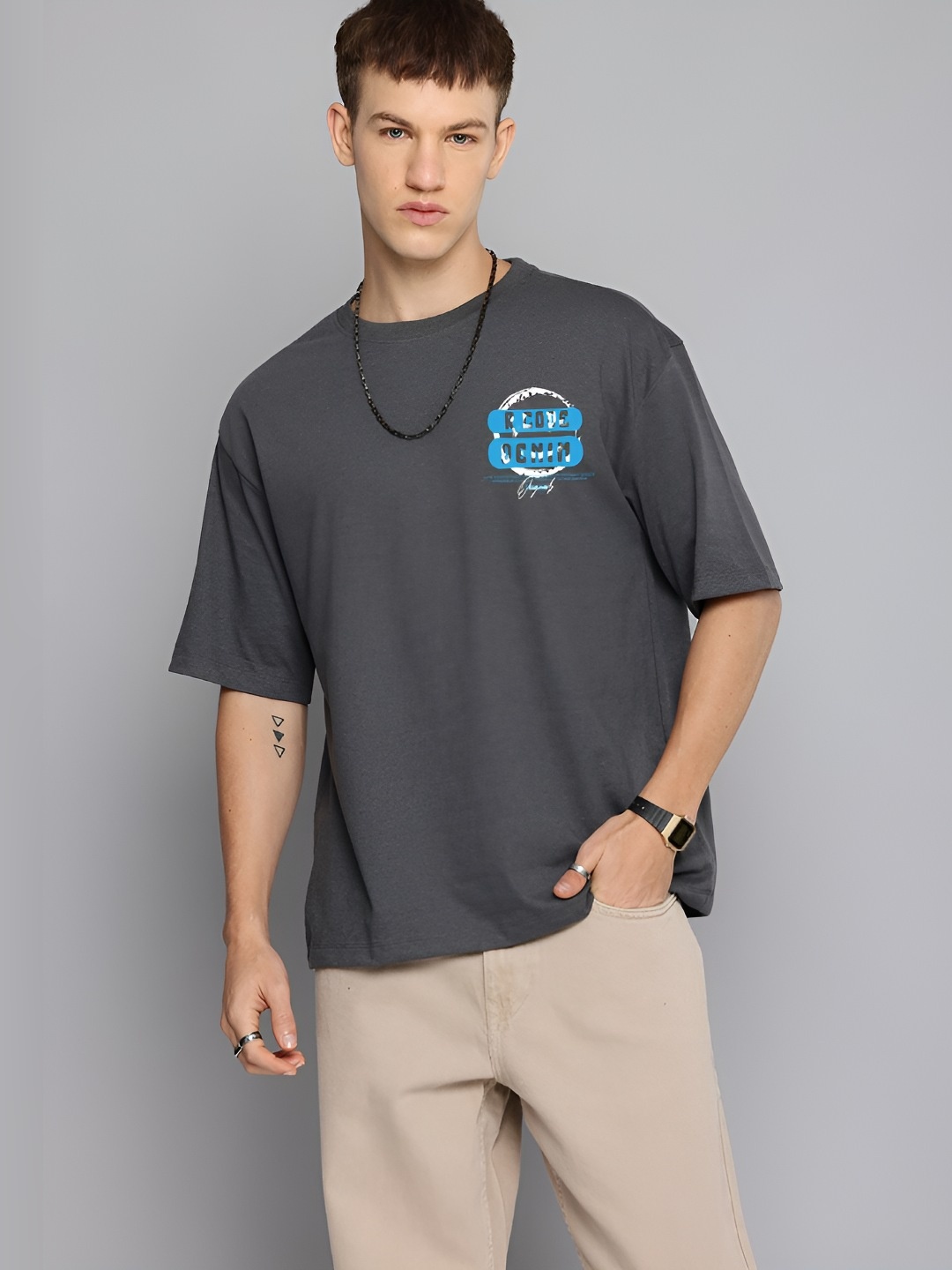 The Roadster Lifestyle Co. Men Graphic Printed Round Neck Cotton Oversized T-shirt, Grey
The Roadster Lifestyle Co. Men Graphic Printed Round Neck Cotton Oversized T-shirt, Grey