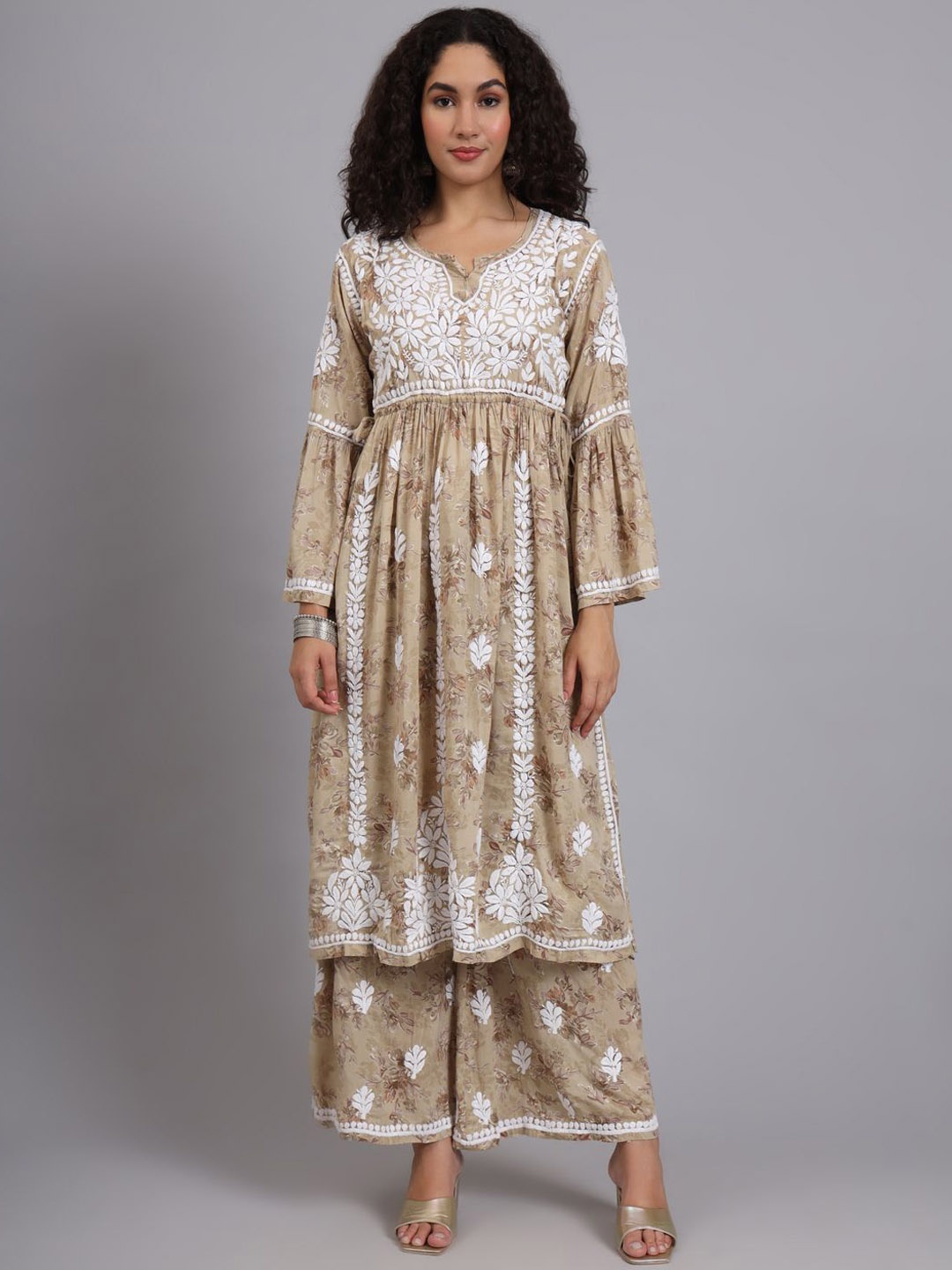 The Chikan Label Women Floral Embroidered Pleated Thread Work Pure Cotton Kurta with Palazzos, Beige
The Chikan Label Women Floral Embroidered Pleated Thread Work Pure Cotton Kurta with Palazzos, Beige