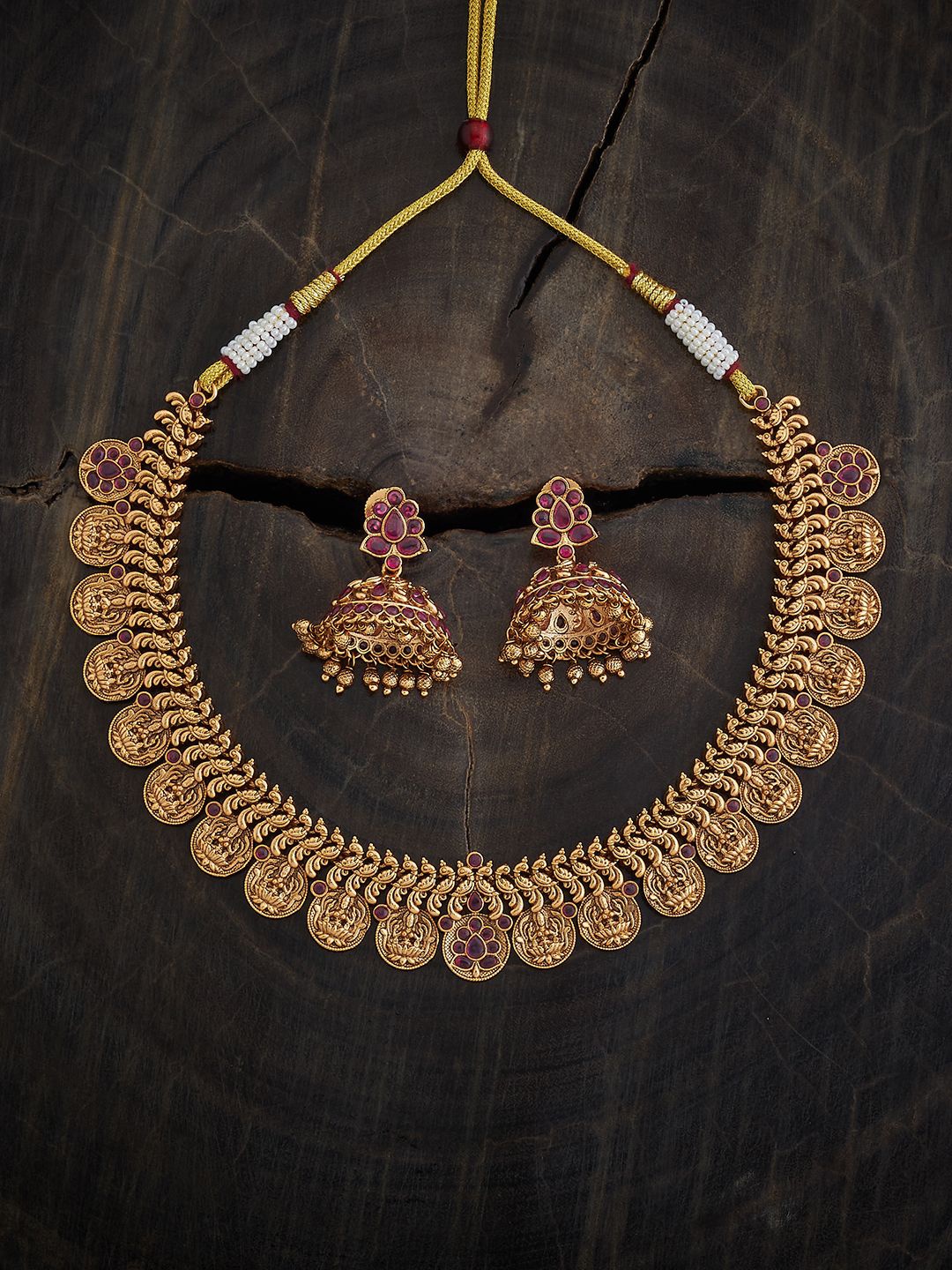 Kushal's Fashion Jewellery Gold-Plated Ruby Stone Studded Antique Necklace and Earrings
Kushal's Fashion Jewellery Gold-Plated Ruby Stone Studded Antique Necklace and Earrings