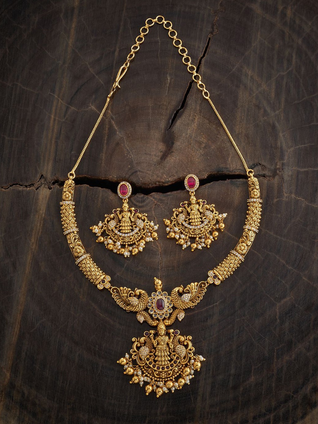 Kushal's Fashion Jewellery Gold Plated CZ Studded & Beaded Antique Necklace and Earrings
Kushal's Fashion Jewellery Gold Plated CZ Studded & Beaded Antique Necklace and Earrings
