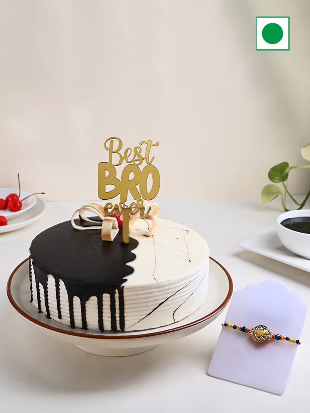 Floweraura Sparkling Meenakari Rakhi With Choco Vanilla Cake With Topper 500 g, Gold
Floweraura Sparkling Meenakari Rakhi With Choco Vanilla Cake With Topper 500 g, Gold