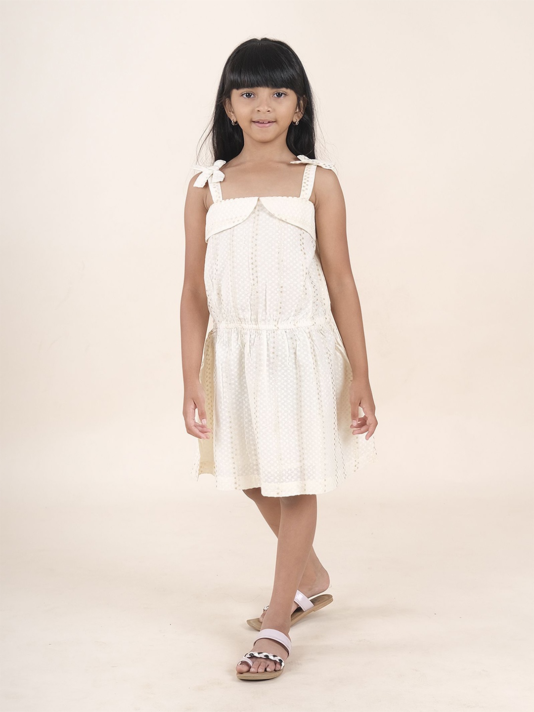 KiddoPanti girls Shoulder Straps Self Design Bow Detailed A-Line Dress, Off white
KiddoPanti girls Shoulder Straps Self Design Bow Detailed A-Line Dress, Off white