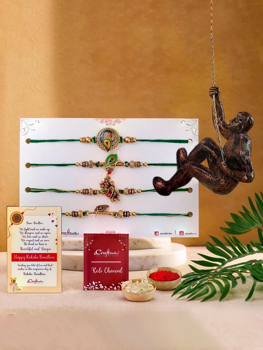 eCraftIndia Set Of 5 Rakhis With Climbing Man Statue & Greeting Card & Roli Chawal, Gold
eCraftIndia Set Of 5 Rakhis With Climbing Man Statue & Greeting Card & Roli Chawal, Gold