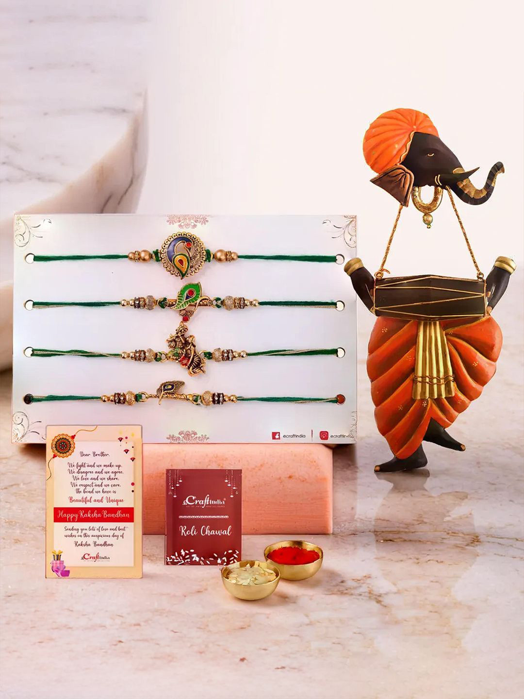 eCraftIndia Set Of 4 Beaded Rakhi With Ganesha Playing Dholak Showpiece, Gold 
eCraftIndia Set Of 4 Beaded Rakhi With Ganesha Playing Dholak Showpiece, Gold