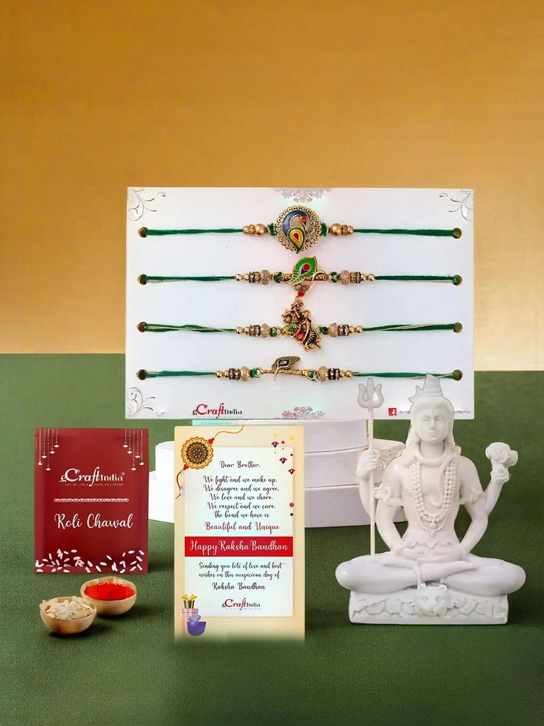 eCraftIndia Set Of 4 Beaded Rakhi Lord Shiva Statue & Greeting Card & Roli Chawal Gift Set, Gold
eCraftIndia Set Of 4 Beaded Rakhi Lord Shiva Statue & Greeting Card & Roli Chawal Gift Set, Gold