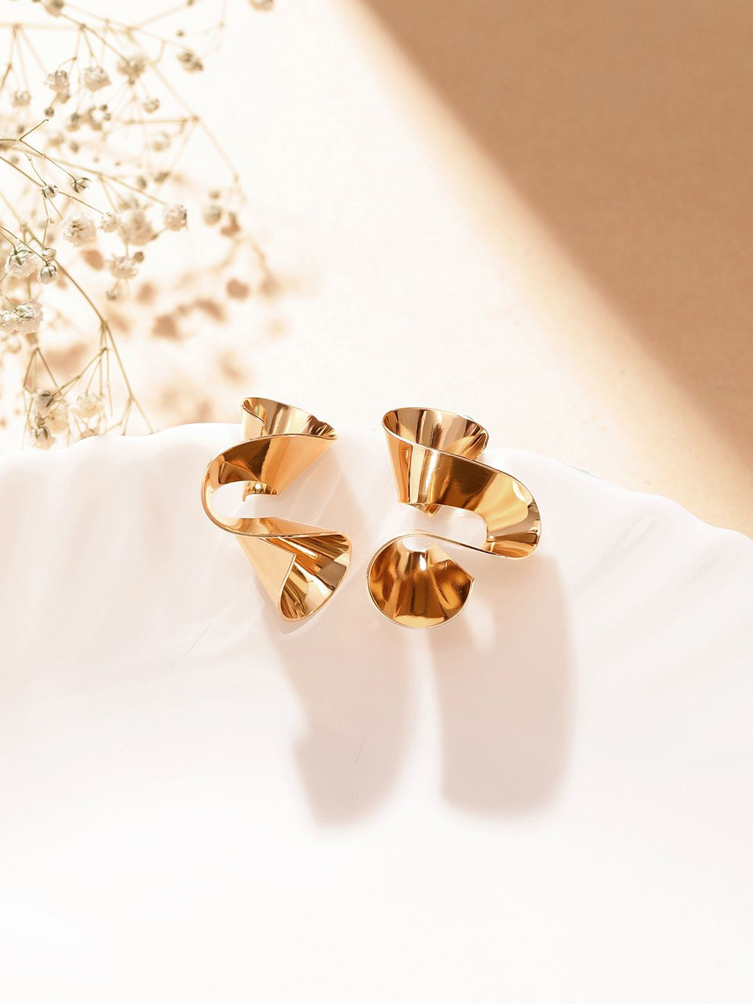 Priyaasi Swirl Pattern Gold Plated Statement Studs
Priyaasi Swirl Pattern Gold Plated Statement Studs