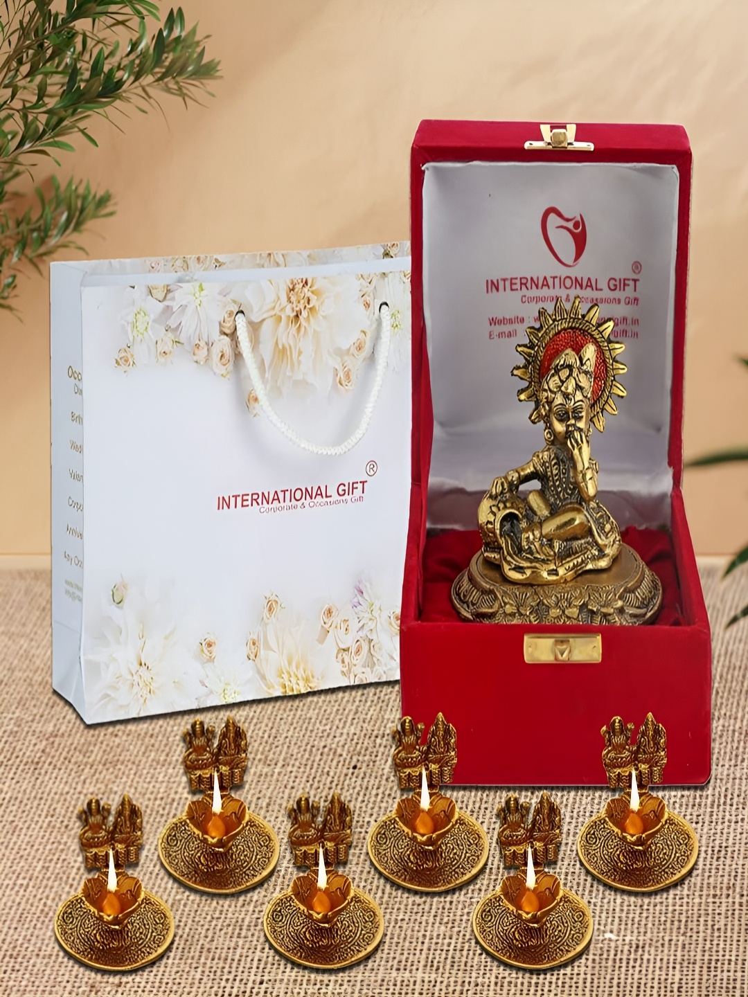 INTERNATIONAL GIFT 7 Pieces Gold-Toned Laddu Gopal Showpiece & Laxmi Ganesha With Box
INTERNATIONAL GIFT 7 Pieces Gold-Toned Laddu Gopal Showpiece & Laxmi Ganesha With Box