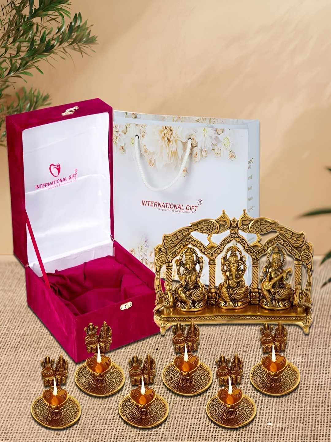 INTERNATIONAL GIFT 7 Pieces Bronze Laxmi Ganesh & Laxmi Ganesh Diyas With Box
INTERNATIONAL GIFT 7 Pieces Bronze Laxmi Ganesh & Laxmi Ganesh Diyas With Box