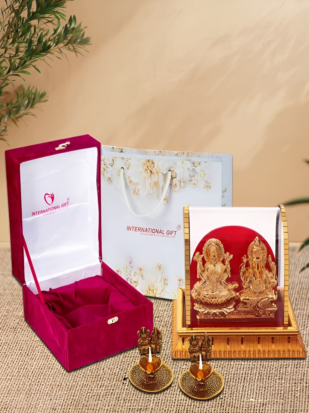 INTERNATIONAL GIFT 3 Pieces Gold-Toned Laxmi Ganesh & Laxmi Ganesh Diyas With Box
INTERNATIONAL GIFT 3 Pieces Gold-Toned Laxmi Ganesh & Laxmi Ganesh Diyas With Box