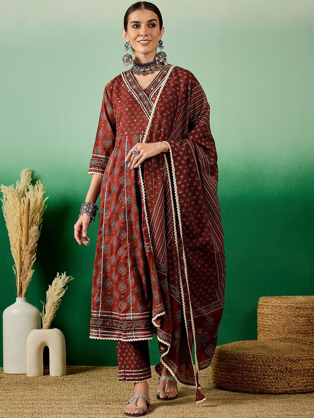 KAVINDI Printed Gotta Patti Jaipuri Cotton Anarkali Kurta with Trousers & Dupatta, Rust
KAVINDI Printed Gotta Patti Jaipuri Cotton Anarkali Kurta with Trousers & Dupatta, Rust