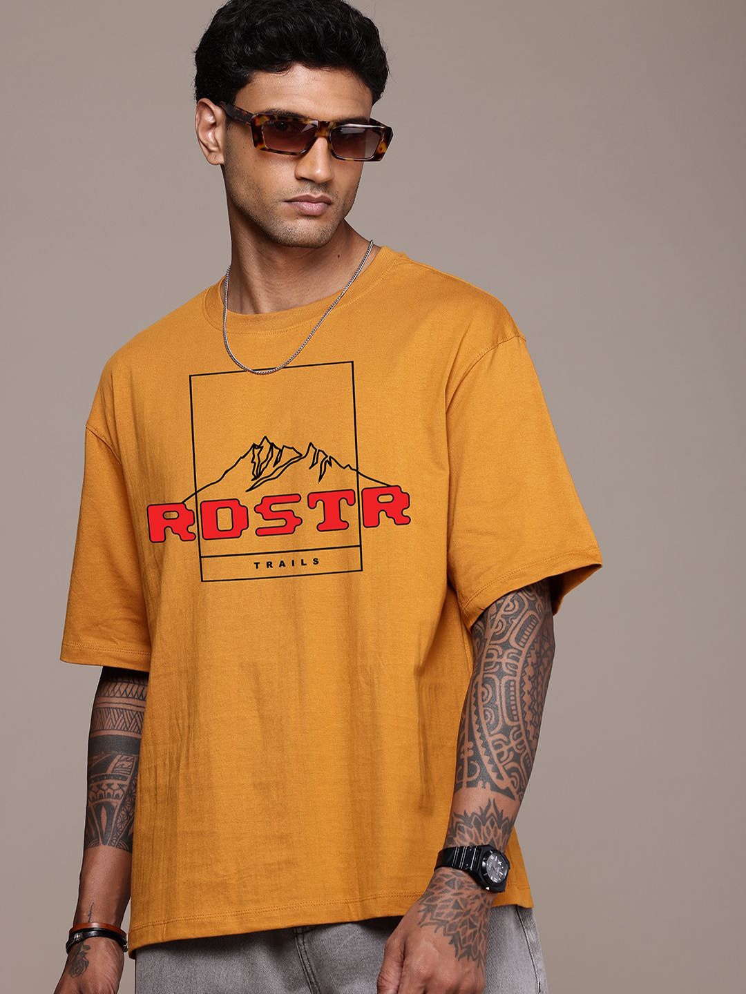 The Roadster Lifestyle Co. Men Graphic Printed Round Neck Cotton Oversized T-Shirt, Mustard
The Roadster Lifestyle Co. Men Graphic Printed Round Neck Cotton Oversized T-Shirt, Mustard