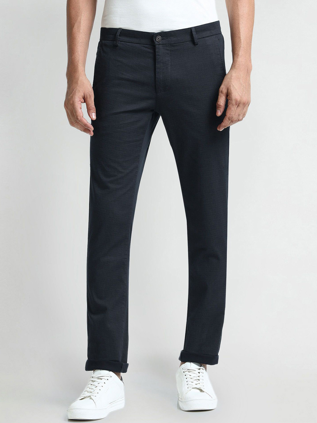 Arrow Sport Men Solid Slim Fit Trousers, Blue 
Arrow Sport Men Solid Slim Fit Trousers, Blue