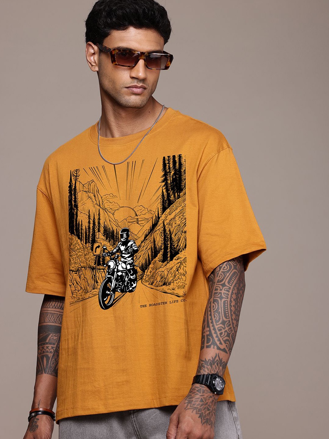 The Roadster Lifestyle Co. Men Graphic Printed Round Neck Cotton Oversized T-Shirt, Mustard
The Roadster Lifestyle Co. Men Graphic Printed Round Neck Cotton Oversized T-Shirt, Mustard