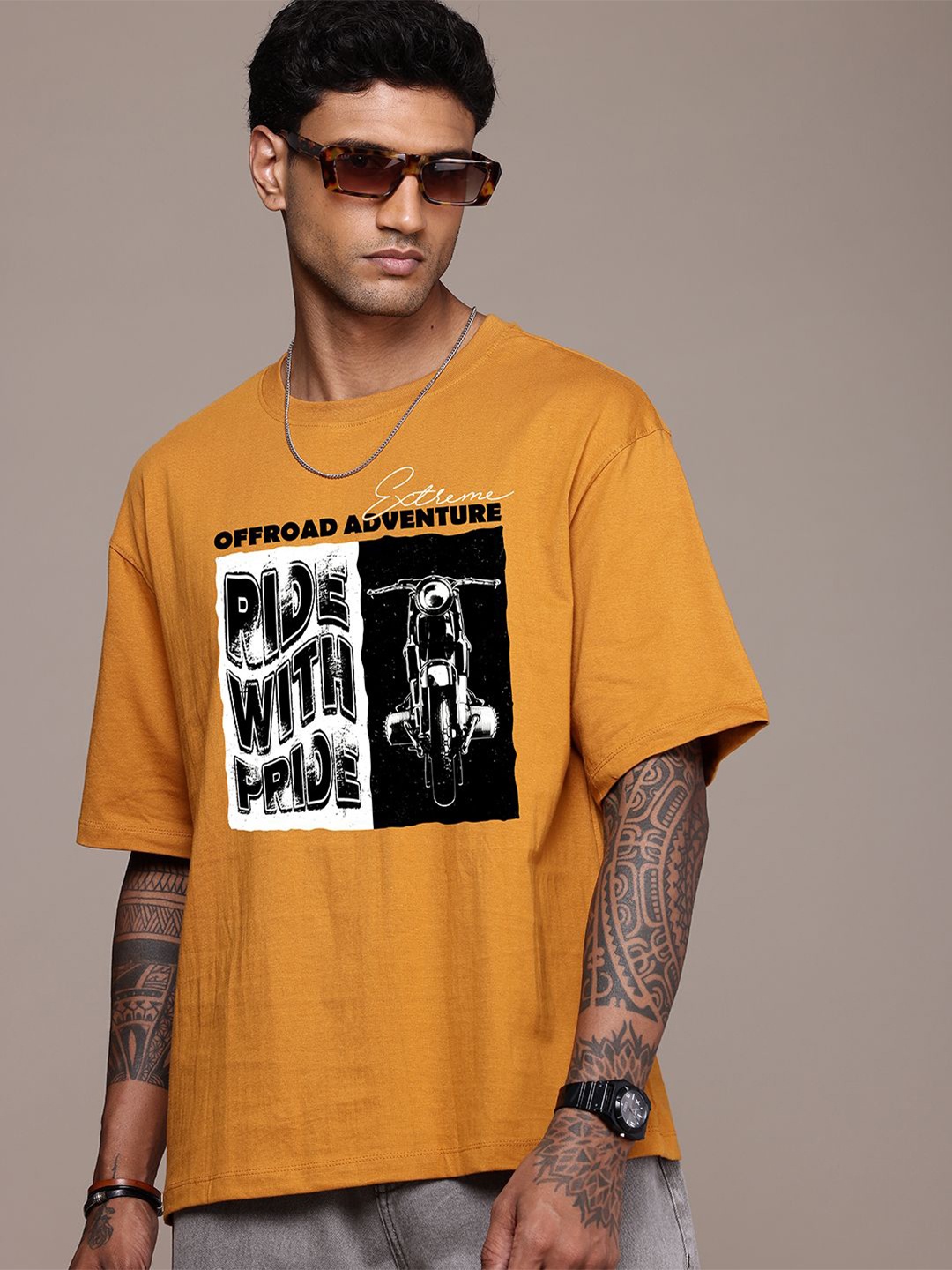 The Roadster Lifestyle Co. Men Graphic Printed Round Neck Cotton Oversized T-Shirt, Mustard
The Roadster Lifestyle Co. Men Graphic Printed Round Neck Cotton Oversized T-Shirt, Mustard