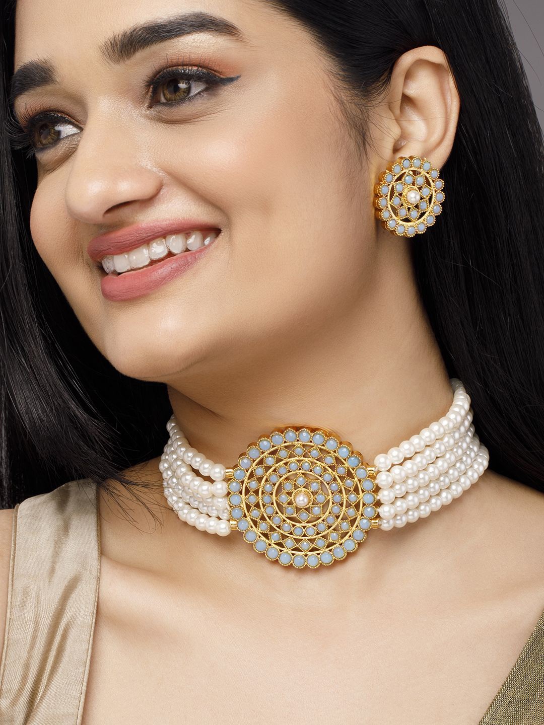 Rubans 22K Gold-Plated Pearl Choker Jewelry Set with Turquoise Blue AD Stone Accents
Rubans 22K Gold-Plated Pearl Choker Jewelry Set with Turquoise Blue AD Stone Accents
