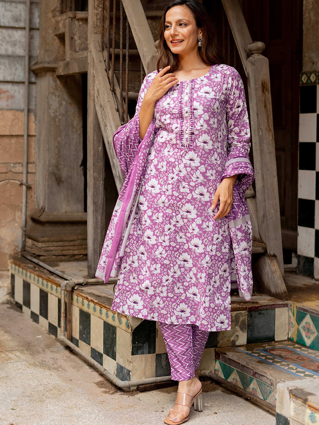 KALINI Floral Printed Thread Work Pure Cotton Straight Kurta with Trousers & Dupatta, Lavender
KALINI Floral Printed Thread Work Pure Cotton Straight Kurta with Trousers & Dupatta, Lavender