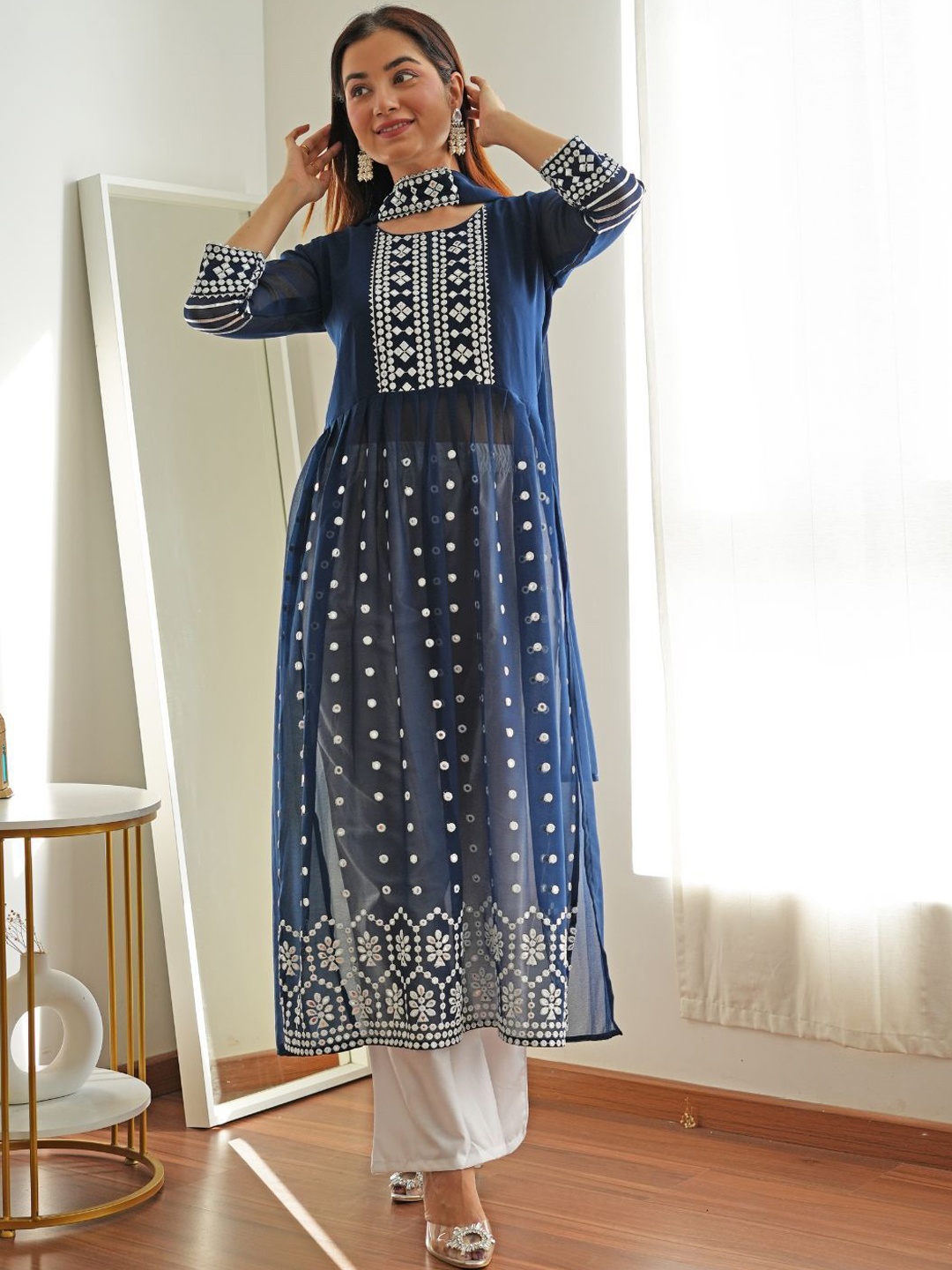 Sangria Navy Blue Floral Embroidered Mirror Work Anarkali Kurta & Trouser With Dupatta
Sangria Navy Blue Floral Embroidered Mirror Work Anarkali Kurta & Trouser With Dupatta
