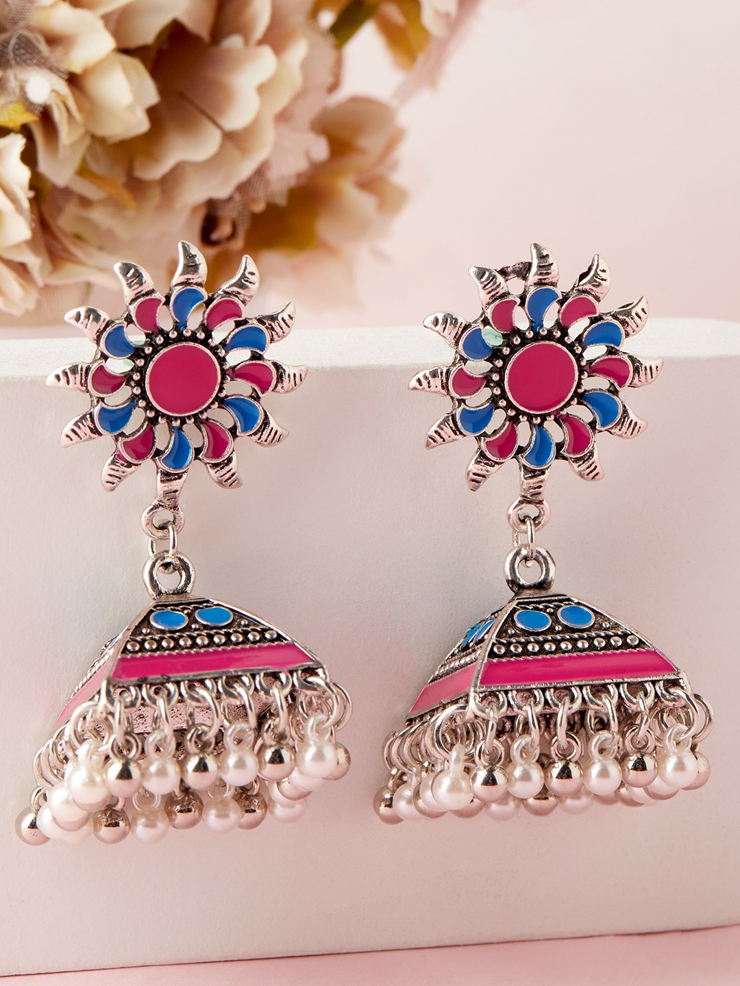 Rubans Oxidized Silver-Plated Pink & Blue Enamel Sunflower Jhumkas with Ghungroo Beads
Rubans Oxidized Silver-Plated Pink & Blue Enamel Sunflower Jhumkas with Ghungroo Beads