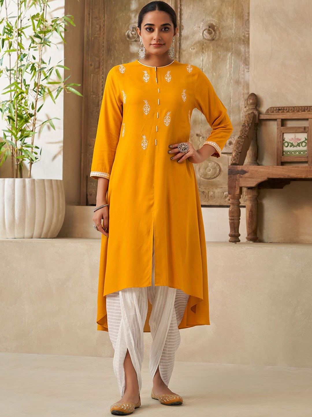 DRESOUL Floral Embroidered High Slit Beads and Stones Kurta with Dhoti Pant, Mustard
DRESOUL Floral Embroidered High Slit Beads and Stones Kurta with Dhoti Pant, Mustard