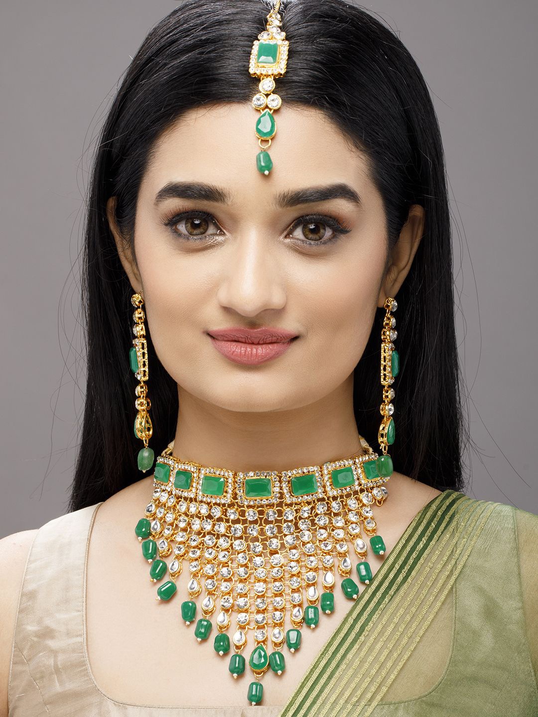 Rubans 22K Gold-Plated Emerald & White AD Kundan Choker Set with Layered Emerald Beads
Rubans 22K Gold-Plated Emerald & White AD Kundan Choker Set with Layered Emerald Beads