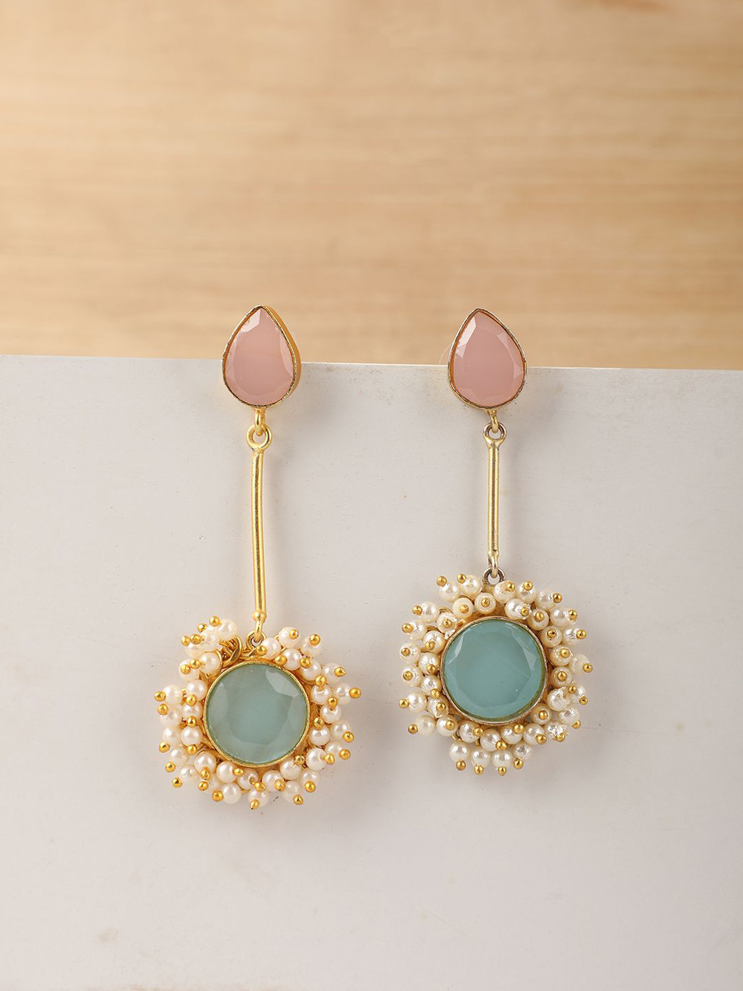 MODE MANIA Gold-Plated Stones Studded & Pearls Beaded Contemporary Drop Earrings
MODE MANIA Gold-Plated Stones Studded & Pearls Beaded Contemporary Drop Earrings