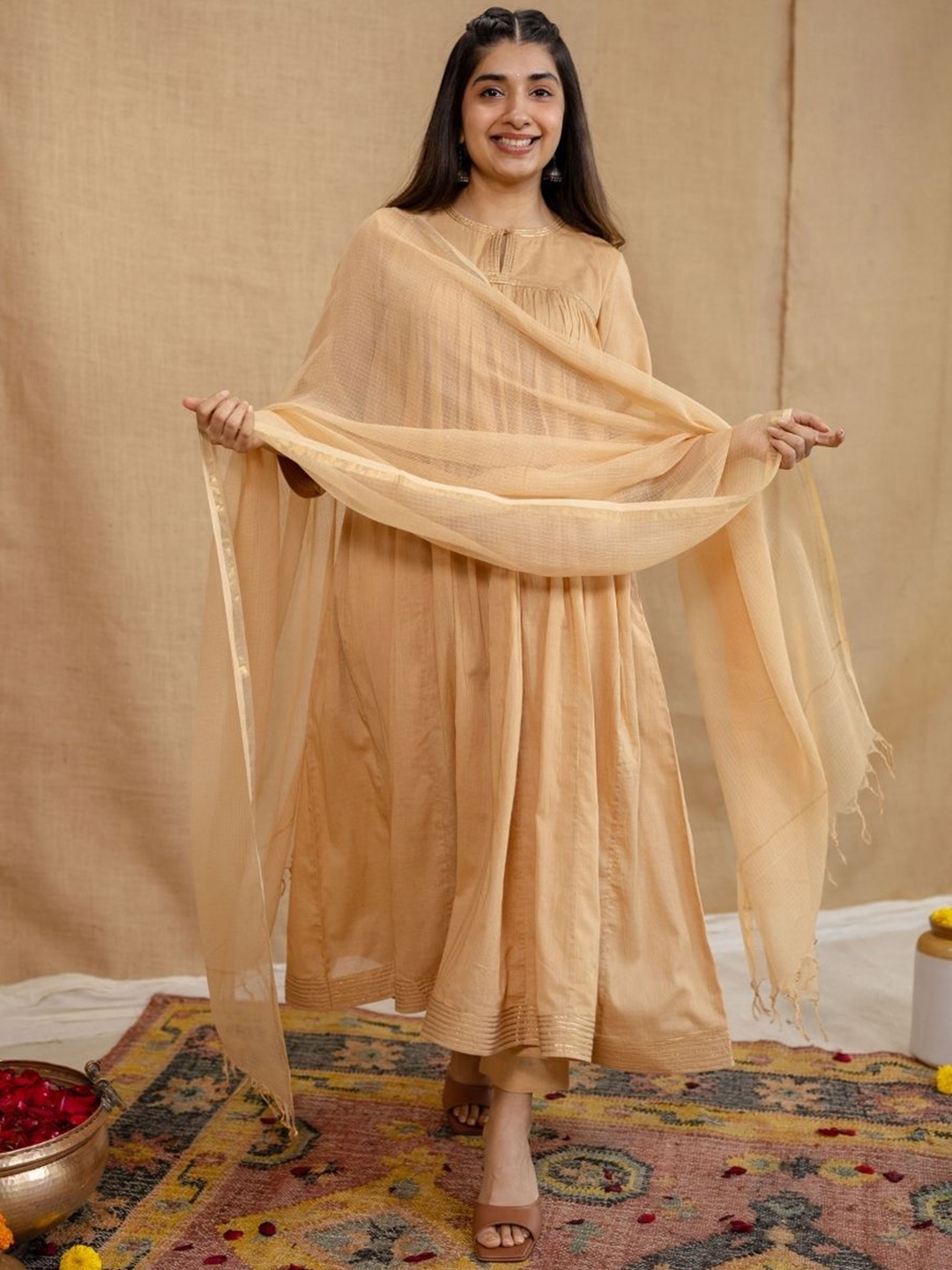 THE INDIAN ETHNIC CO Pleated MulMul Pure Cotton Kurta With Trousers & Dupatta, Beige
THE INDIAN ETHNIC CO Pleated MulMul Pure Cotton Kurta With Trousers & Dupatta, Beige